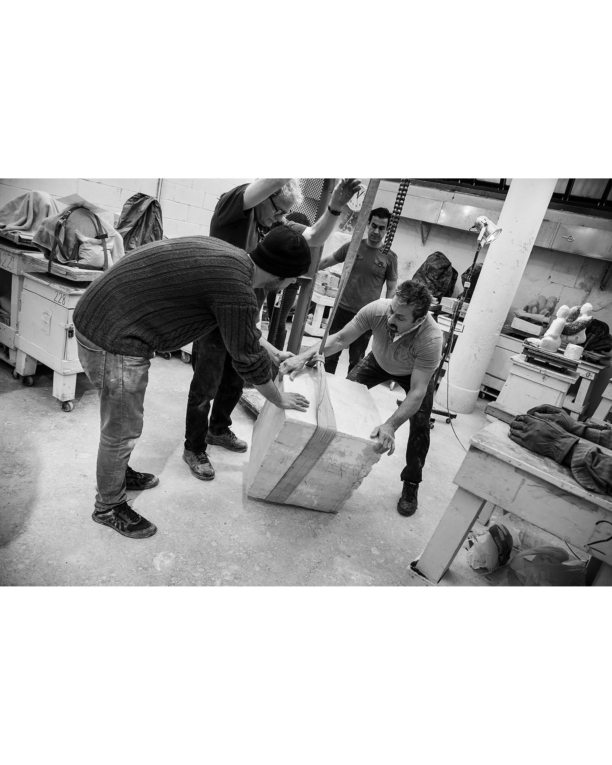 Receiving a raw block of marble in the studio. Photo by Sarah Macel.