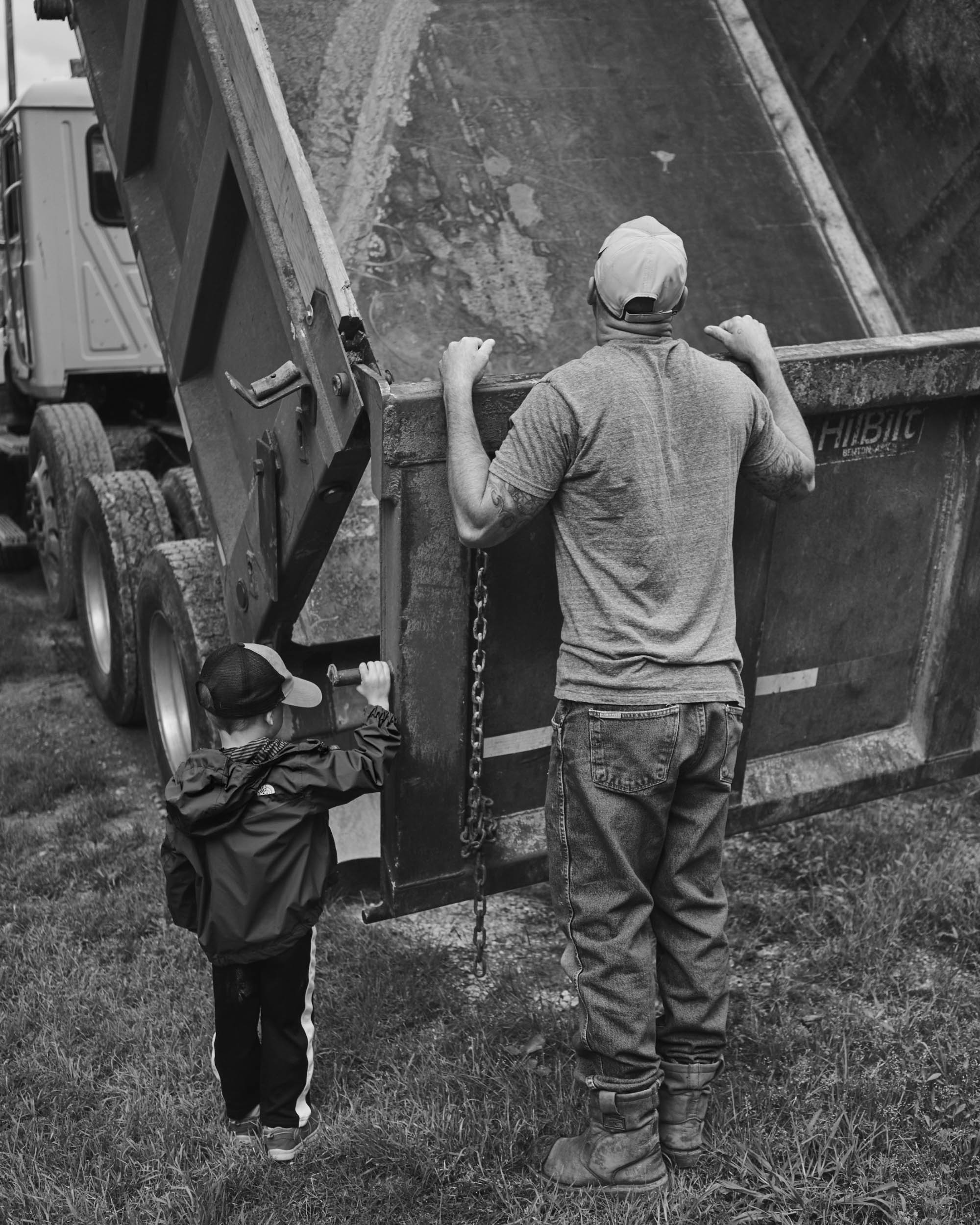 Greg and his son at home. Photo by Justin Hollar.